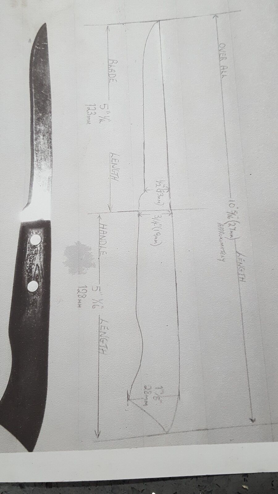 Close view of type of filleting knife showing dimensions