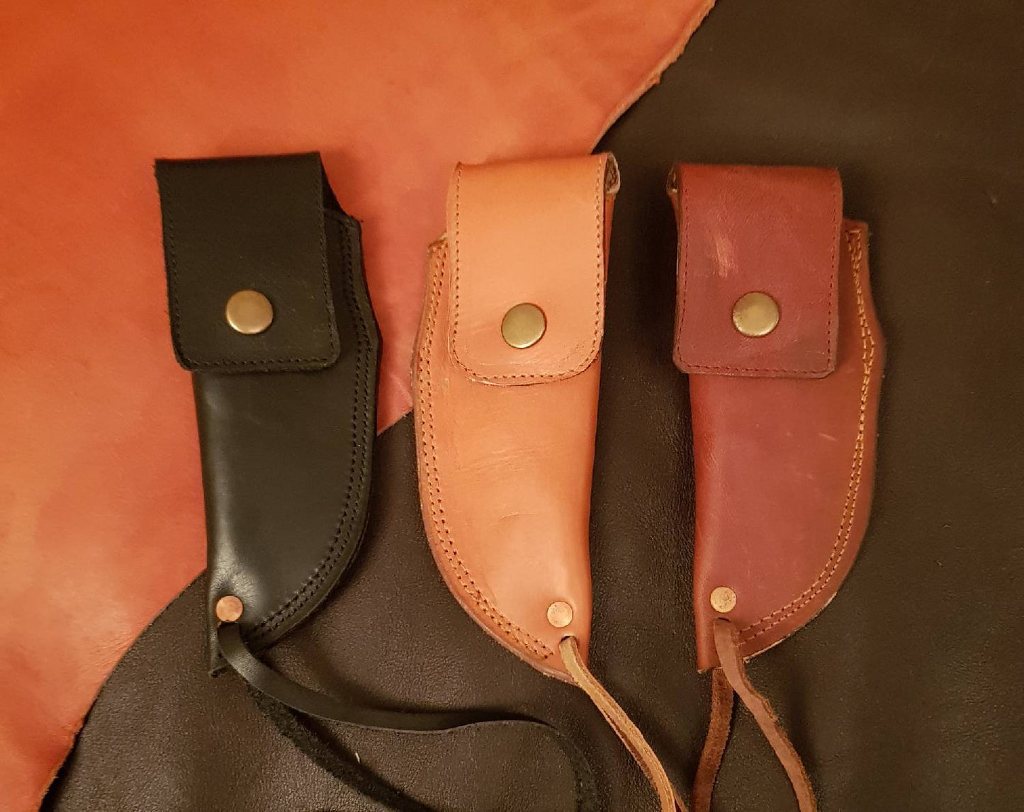 Leather neck sheath for folding knives