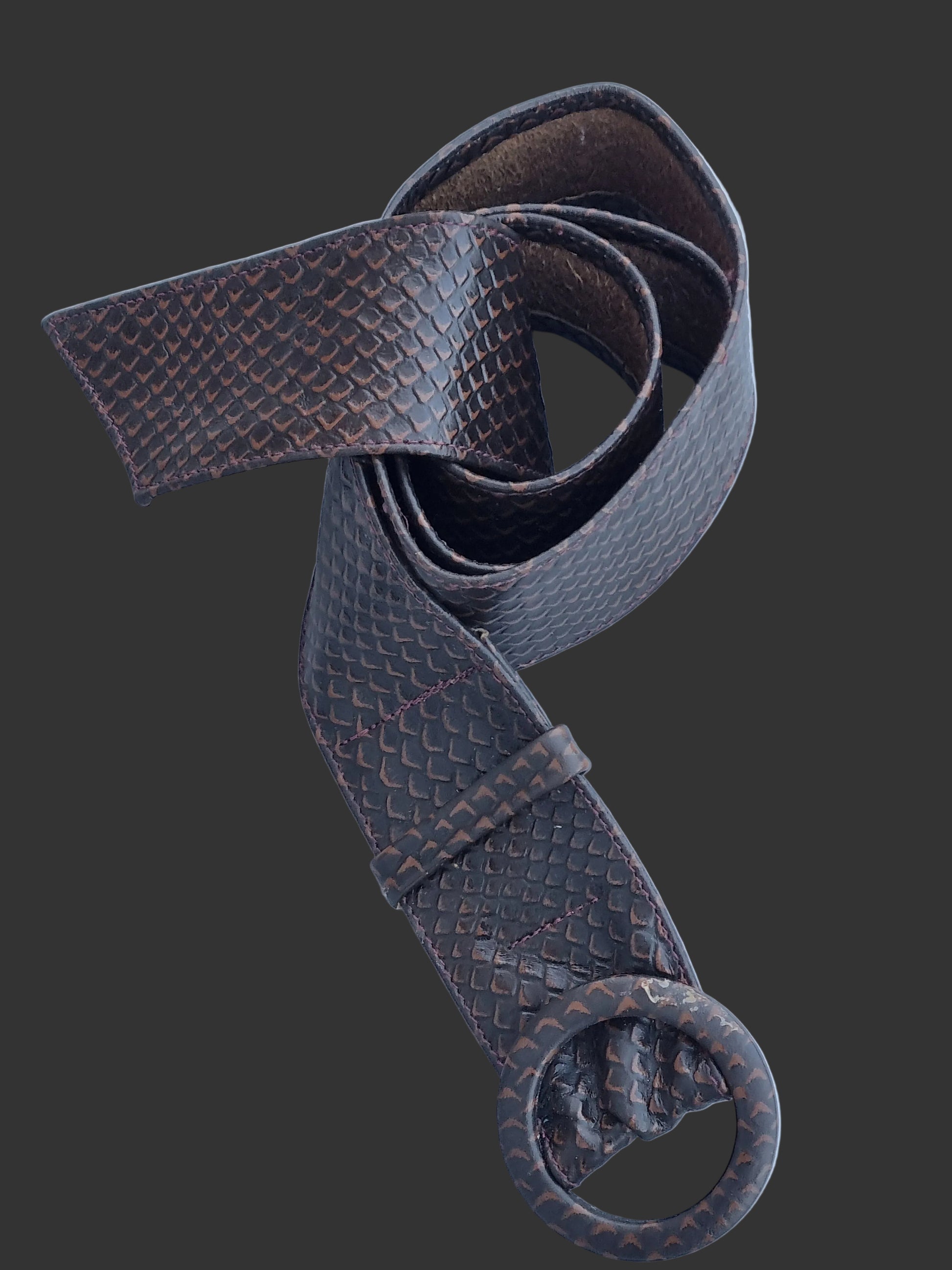 A dark brown rattle snakeskin embossed leather belt with matching leather covered buckle, displayed on a light blue background.