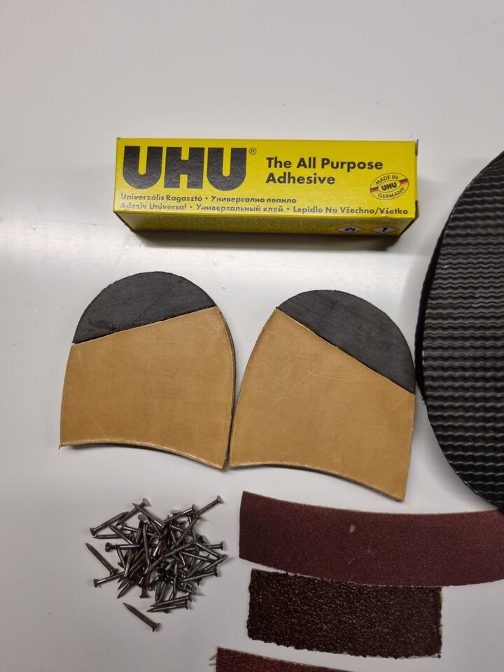 Close up view  Quarter Rubber Leather Heels Stick on Soles  Tacks Adhesive Emery paper