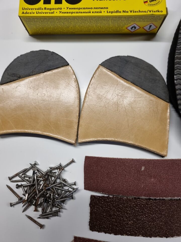 Close view of Quarter Rubber Leather Heels  Tacks Adhesive Emery paper