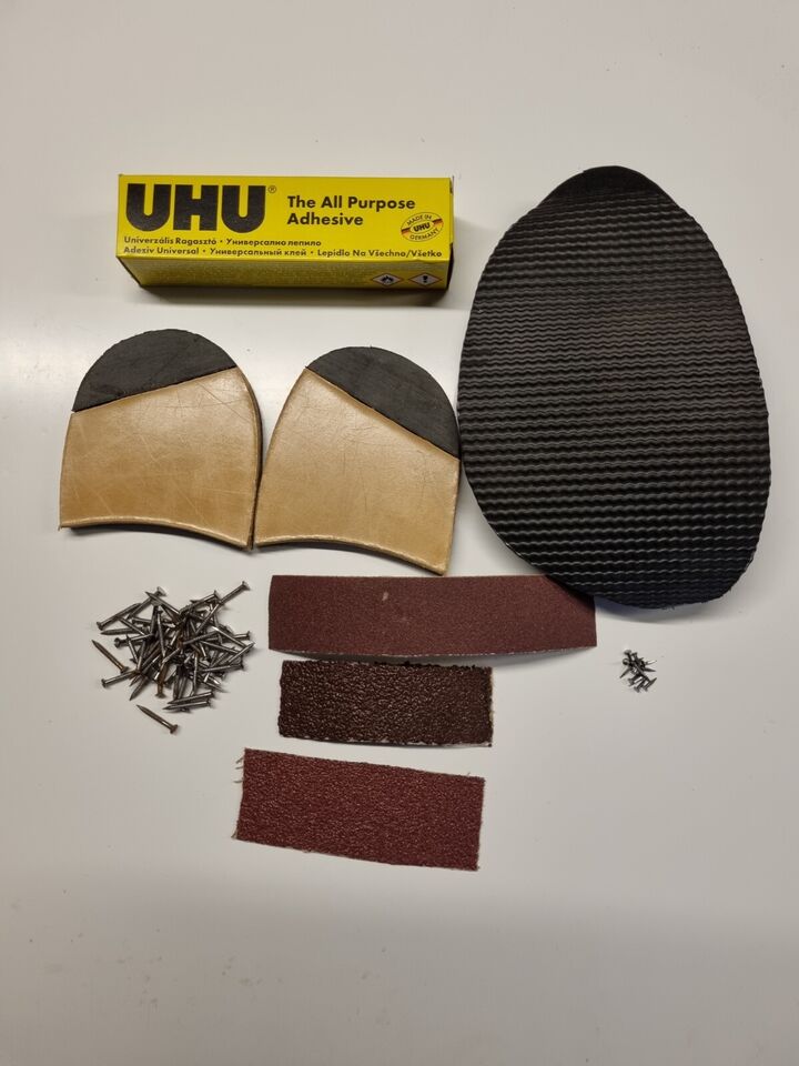 Close view of quarter Rubber Leather Heels plus Stick on Soles , Tacks,  Adhesive, Emery paper and nails